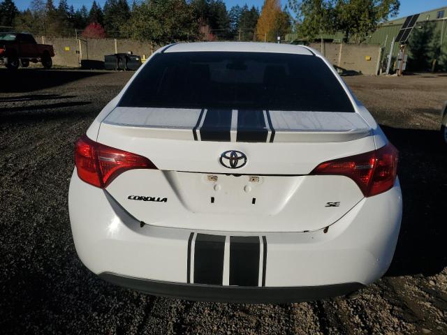 Photo 5 VIN: 5YFBURHE4HP658875 - TOYOTA COROLLA L 