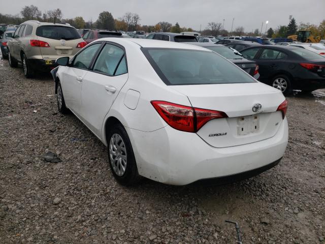 Photo 2 VIN: 5YFBURHE4HP661355 - TOYOTA COROLLA L 