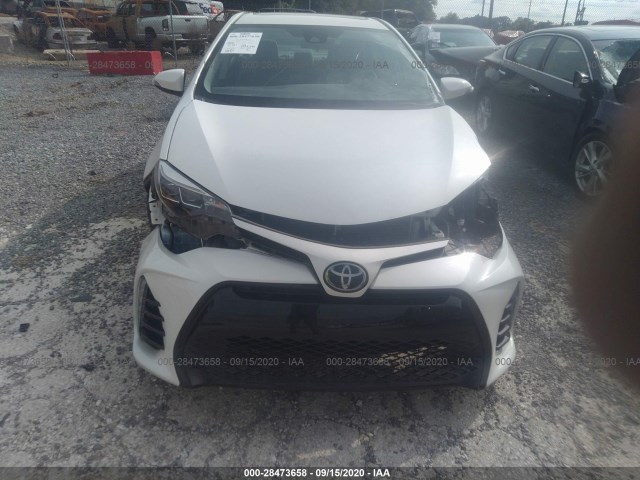 Photo 5 VIN: 5YFBURHE4HP714989 - TOYOTA COROLLA 