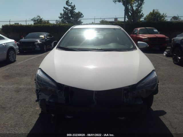 Photo 5 VIN: 5YFBURHE4HP723949 - TOYOTA COROLLA 