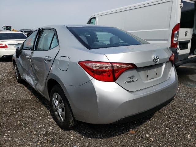 Photo 2 VIN: 5YFBURHE4JP740210 - TOYOTA COROLLA L 