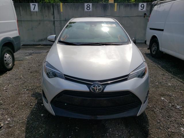 Photo 8 VIN: 5YFBURHE4JP740210 - TOYOTA COROLLA L 