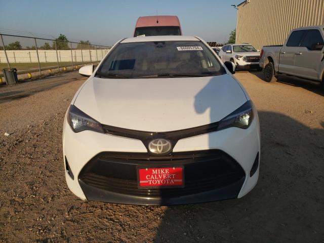 Photo 4 VIN: 5YFBURHE4JP743690 - TOYOTA COROLLA L 