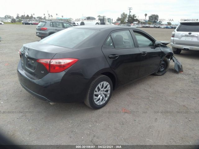 Photo 3 VIN: 5YFBURHE4JP752910 - TOYOTA COROLLA 