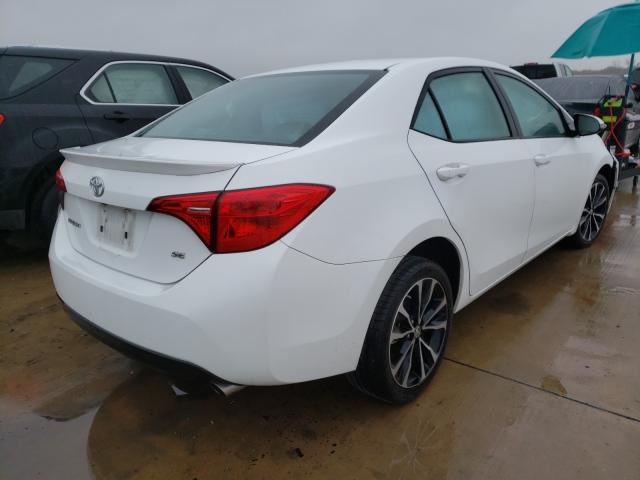 Photo 2 VIN: 5YFBURHE4JP756665 - TOYOTA COROLLA L 