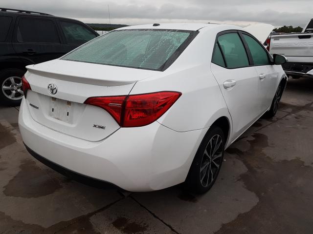 Photo 3 VIN: 5YFBURHE4JP759744 - TOYOTA COROLLA L 