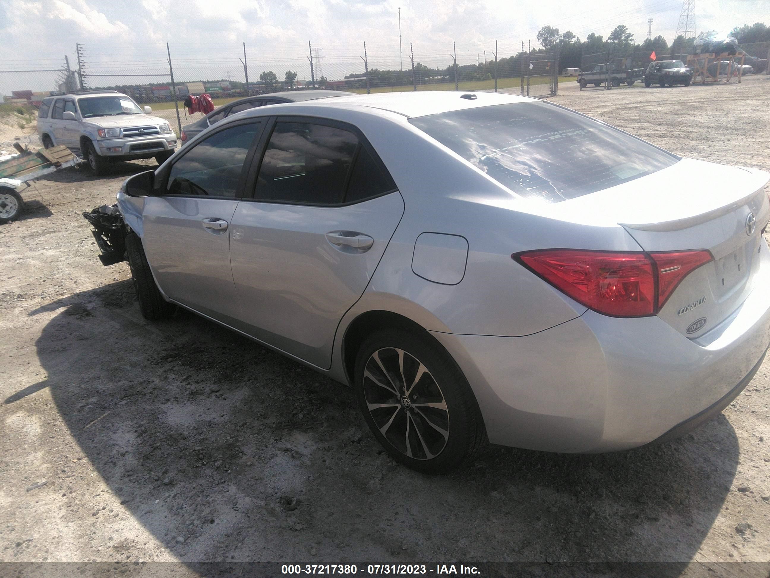 Photo 2 VIN: 5YFBURHE4JP773059 - TOYOTA COROLLA 