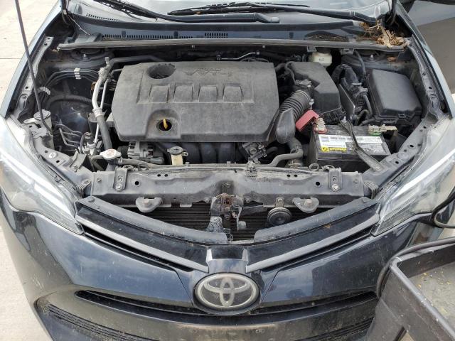 Photo 10 VIN: 5YFBURHE4JP779718 - TOYOTA COROLLA L 