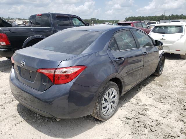 Photo 3 VIN: 5YFBURHE4JP785728 - TOYOTA COROLLA L 