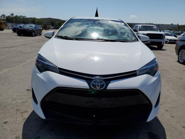 Photo 4 VIN: 5YFBURHE4JP789746 - TOYOTA COROLLA L 