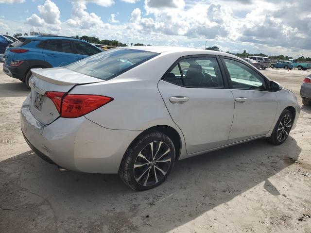 Photo 2 VIN: 5YFBURHE4JP798527 - TOYOTA COROLLA L 