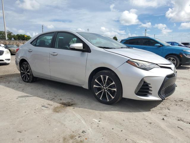 Photo 3 VIN: 5YFBURHE4JP798527 - TOYOTA COROLLA L 