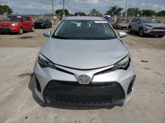 Photo 4 VIN: 5YFBURHE4JP798527 - TOYOTA COROLLA L 