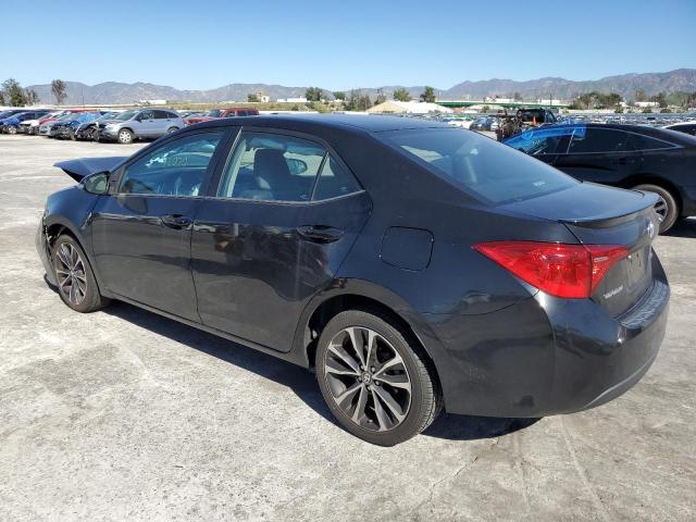 Photo 1 VIN: 5YFBURHE4JP798866 - TOYOTA COROLLA L 