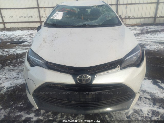 Photo 5 VIN: 5YFBURHE4JP803922 - TOYOTA COROLLA 