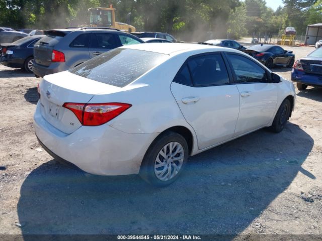 Photo 3 VIN: 5YFBURHE4JP810627 - TOYOTA COROLLA 