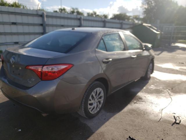 Photo 3 VIN: 5YFBURHE4JP815102 - TOYOTA COROLLA L 