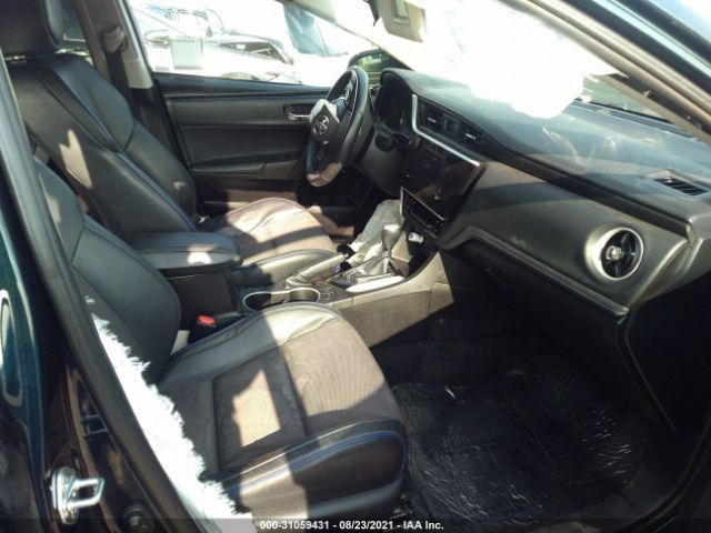 Photo 4 VIN: 5YFBURHE4JP824303 - TOYOTA COROLLA 