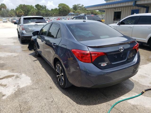 Photo 2 VIN: 5YFBURHE4KP858629 - TOYOTA COROLLA L 