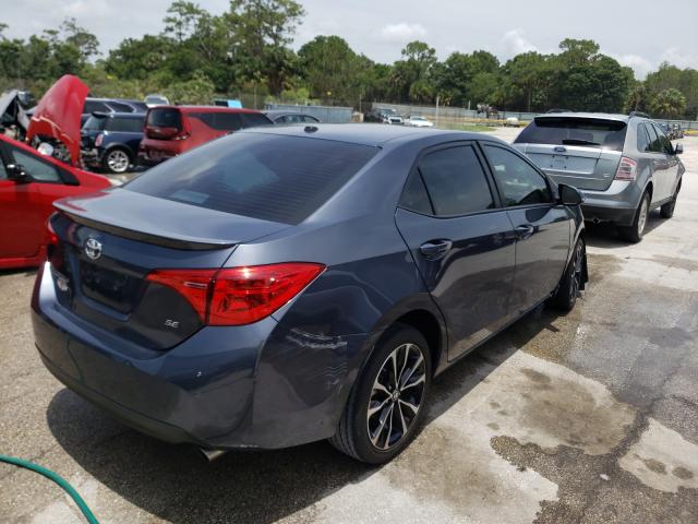 Photo 3 VIN: 5YFBURHE4KP858629 - TOYOTA COROLLA L 