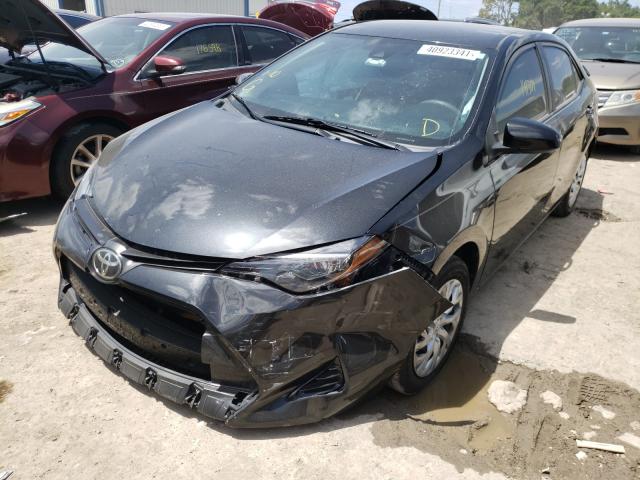 Photo 1 VIN: 5YFBURHE4KP861529 - TOYOTA COROLLA L 