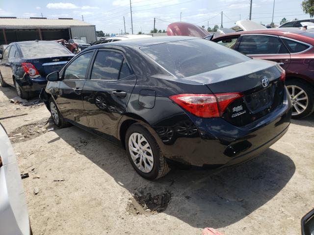 Photo 2 VIN: 5YFBURHE4KP861529 - TOYOTA COROLLA L 