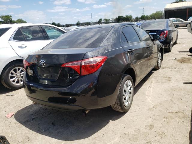 Photo 3 VIN: 5YFBURHE4KP861529 - TOYOTA COROLLA L 