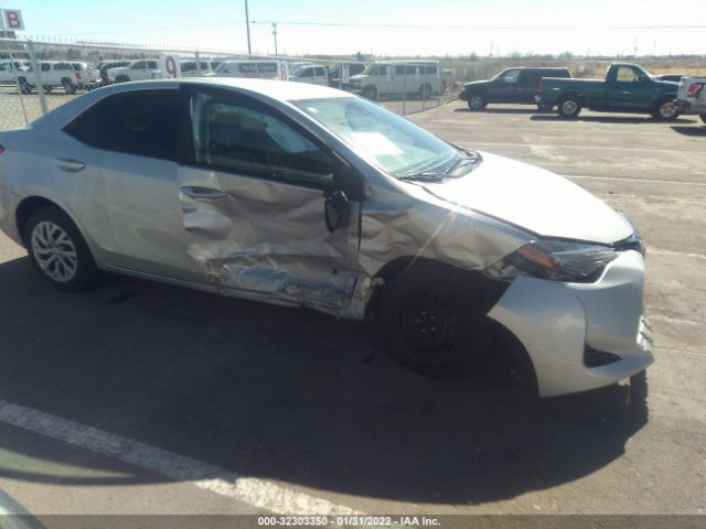 Photo 5 VIN: 5YFBURHE4KP863233 - TOYOTA COROLLA 