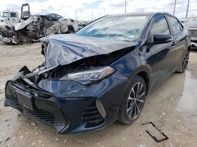 Photo 1 VIN: 5YFBURHE4KP867377 - TOYOTA COROLLA L 