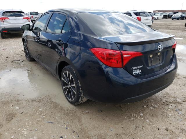 Photo 2 VIN: 5YFBURHE4KP867377 - TOYOTA COROLLA L 