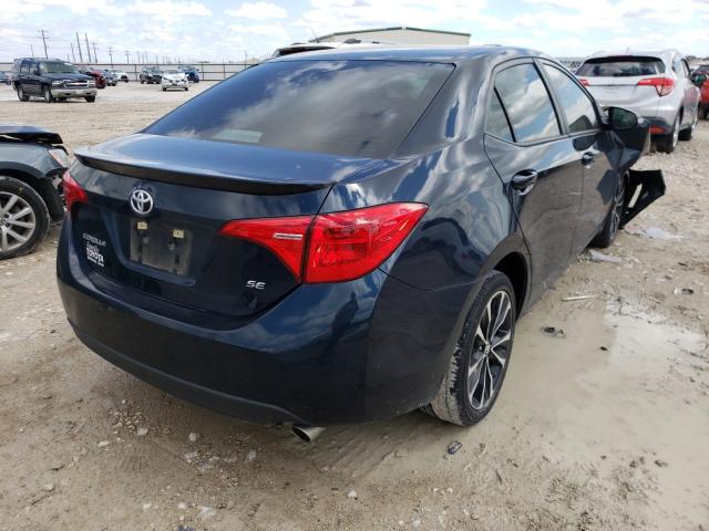 Photo 3 VIN: 5YFBURHE4KP867377 - TOYOTA COROLLA L 