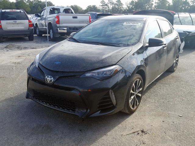 Photo 1 VIN: 5YFBURHE4KP867749 - TOYOTA COROLLA L 