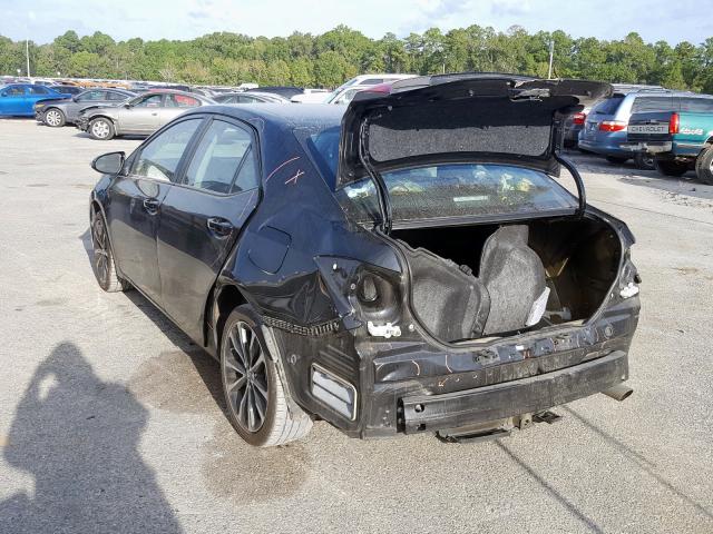 Photo 2 VIN: 5YFBURHE4KP867749 - TOYOTA COROLLA L 