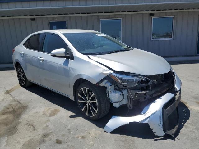 Photo 3 VIN: 5YFBURHE4KP869498 - TOYOTA COROLLA L 