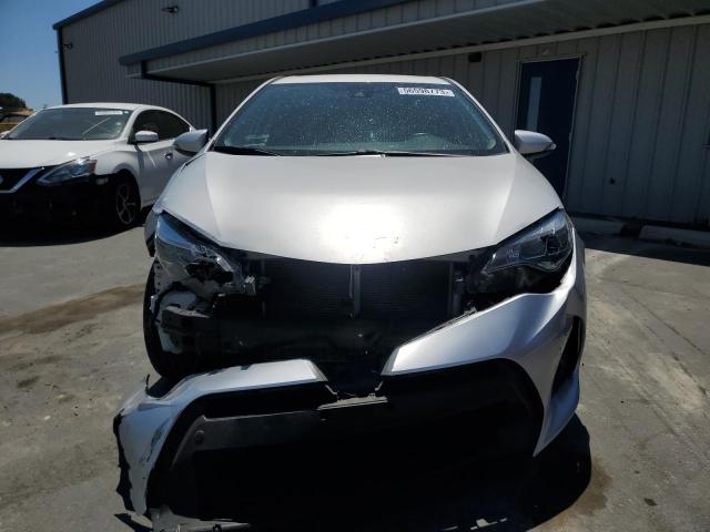 Photo 4 VIN: 5YFBURHE4KP869498 - TOYOTA COROLLA L 