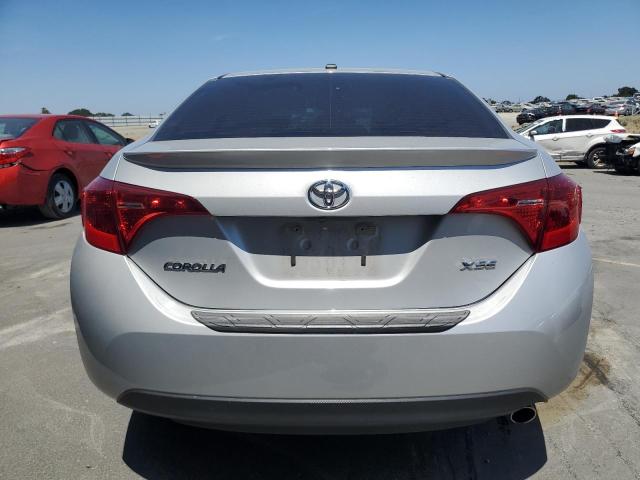 Photo 5 VIN: 5YFBURHE4KP869498 - TOYOTA COROLLA L 