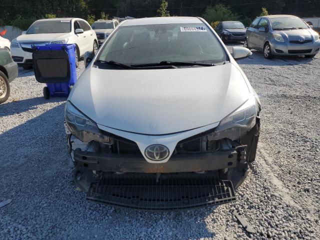 Photo 4 VIN: 5YFBURHE4KP870019 - TOYOTA COROLLA L 