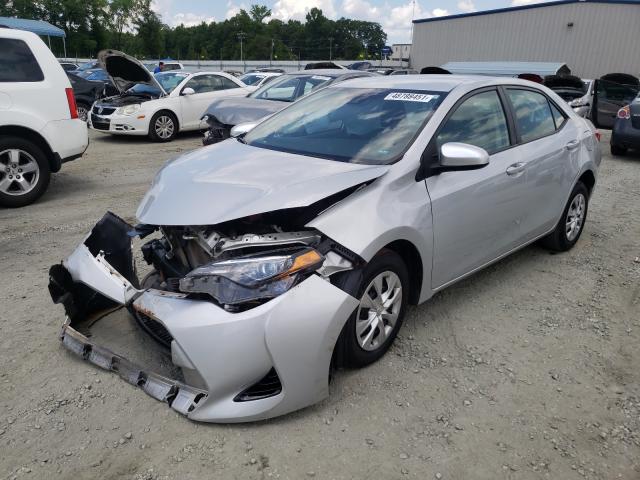 Photo 1 VIN: 5YFBURHE4KP870134 - TOYOTA COROLLA L 