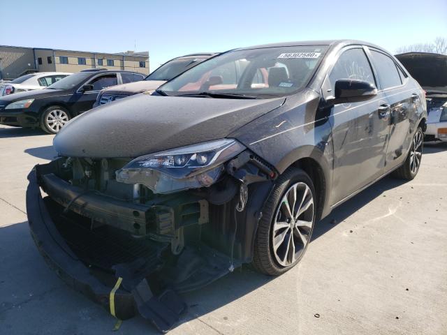 Photo 1 VIN: 5YFBURHE4KP870974 - TOYOTA COROLLA L 