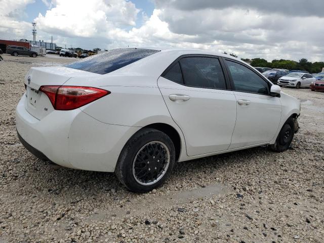 Photo 2 VIN: 5YFBURHE4KP876192 - TOYOTA COROLLA L 