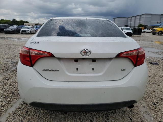 Photo 5 VIN: 5YFBURHE4KP876192 - TOYOTA COROLLA L 