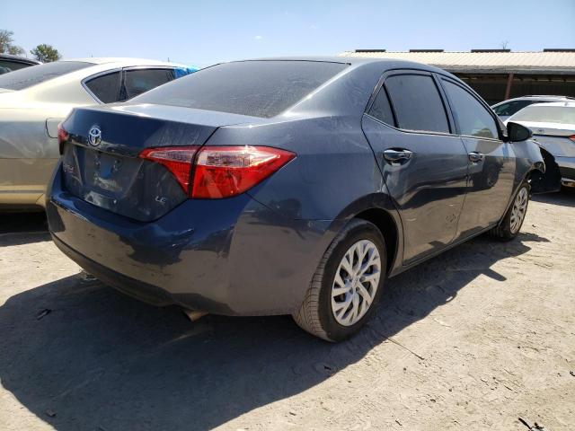 Photo 2 VIN: 5YFBURHE4KP876970 - TOYOTA COROLLA L 