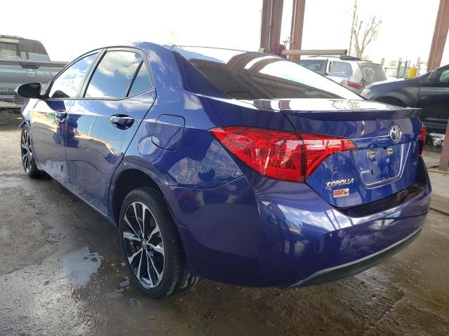 Photo 2 VIN: 5YFBURHE4KP877035 - TOYOTA COROLLA L 