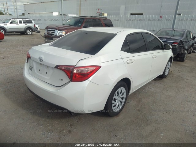 Photo 3 VIN: 5YFBURHE4KP877228 - TOYOTA COROLLA 