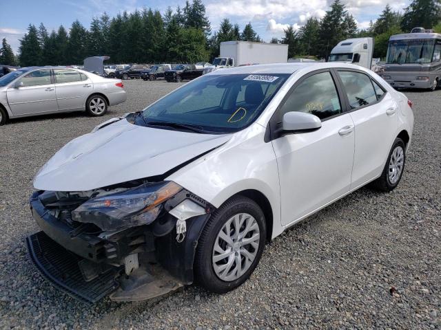 Photo 1 VIN: 5YFBURHE4KP879058 - TOYOTA COROLLA L 