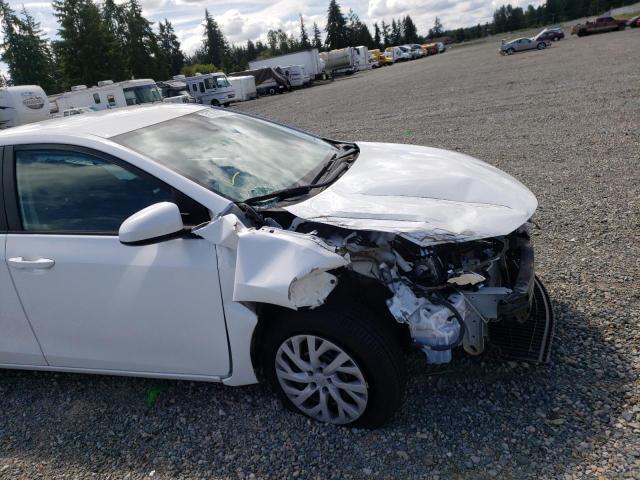 Photo 8 VIN: 5YFBURHE4KP879058 - TOYOTA COROLLA L 