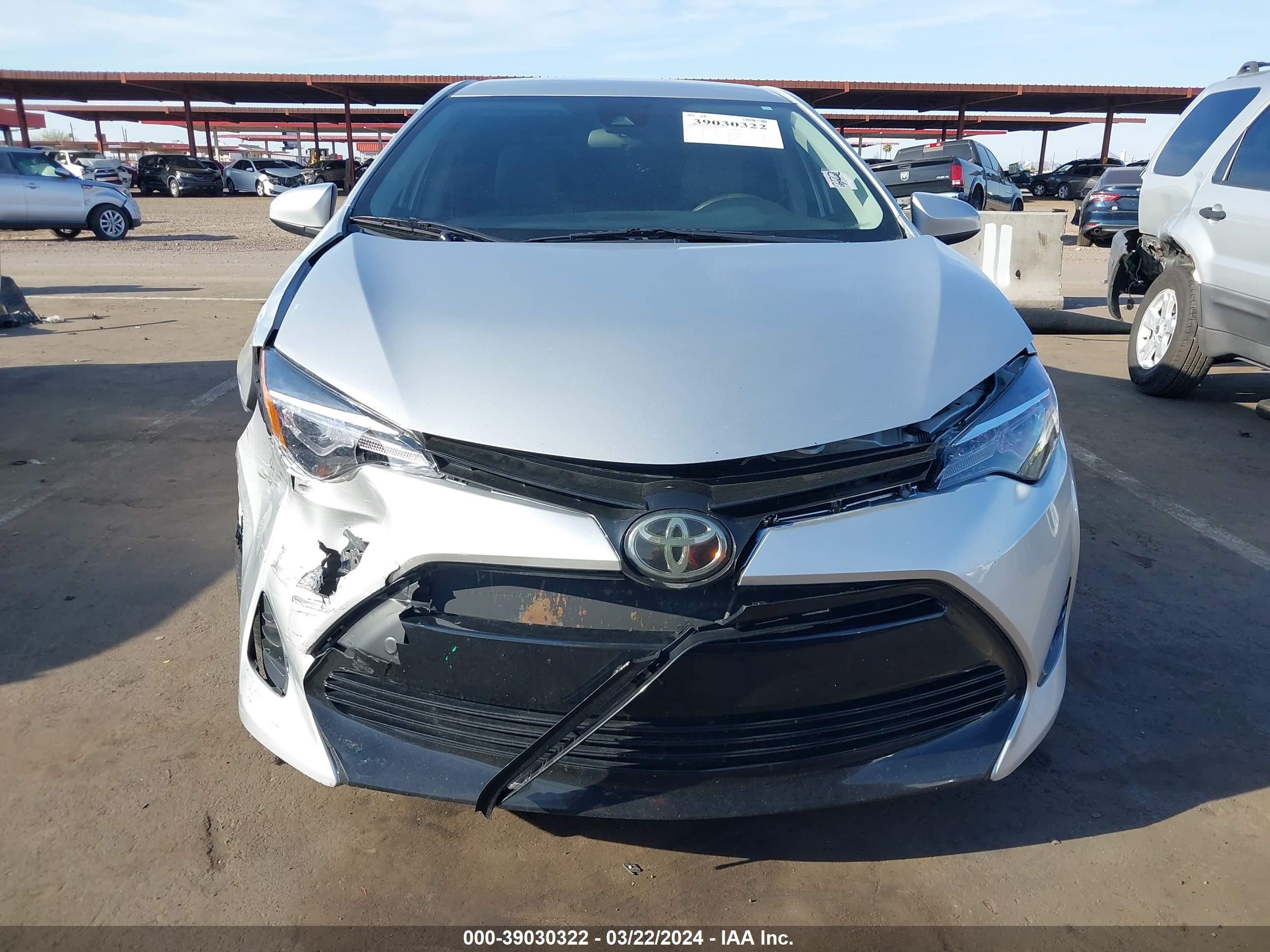 Photo 10 VIN: 5YFBURHE4KP879724 - TOYOTA COROLLA 