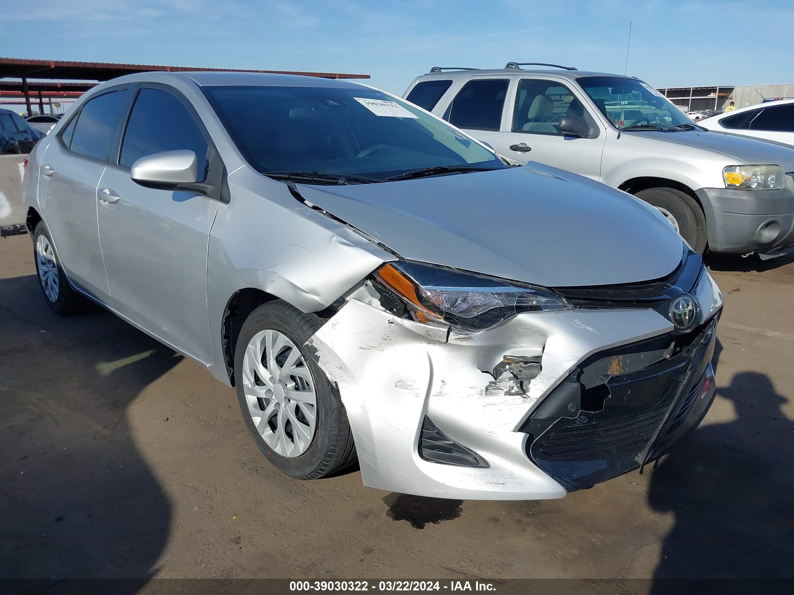 Photo 5 VIN: 5YFBURHE4KP879724 - TOYOTA COROLLA 