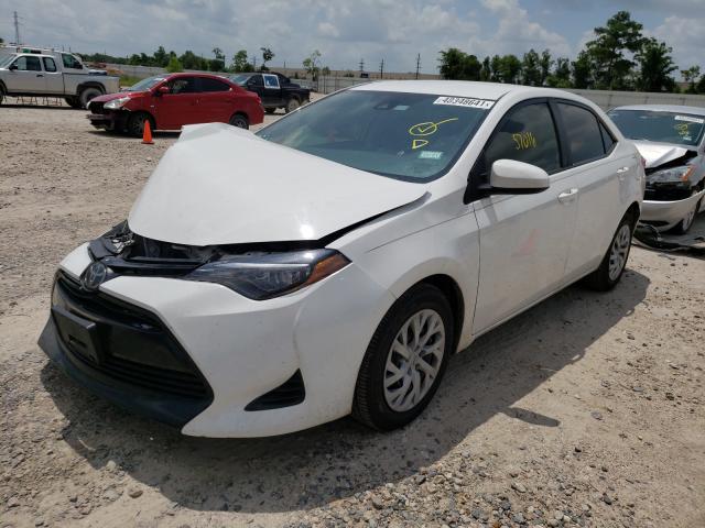 Photo 1 VIN: 5YFBURHE4KP882638 - TOYOTA COROLLA L 