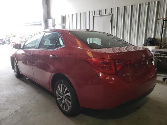 Photo 2 VIN: 5YFBURHE4KP882719 - TOYOTA COROLLA L 